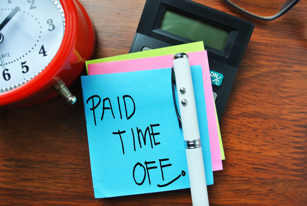 Sticky note with paid time off