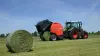 KUHN VB 3260 series round baler baling in the field